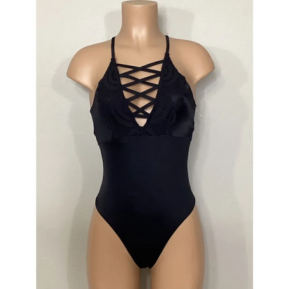 New. Pilyq LACE front with black lace trim swimsuit. Run small